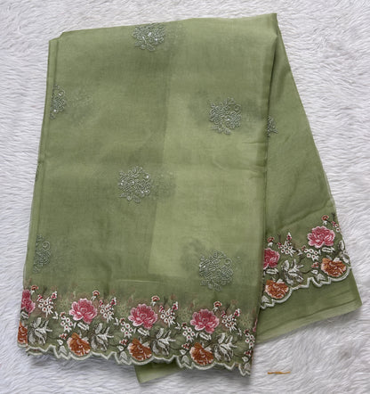 Soft Organza Designer Saree Olive Green colored Saree complemented with a Machine Embroidery border. - Sampradaya Designer Studio