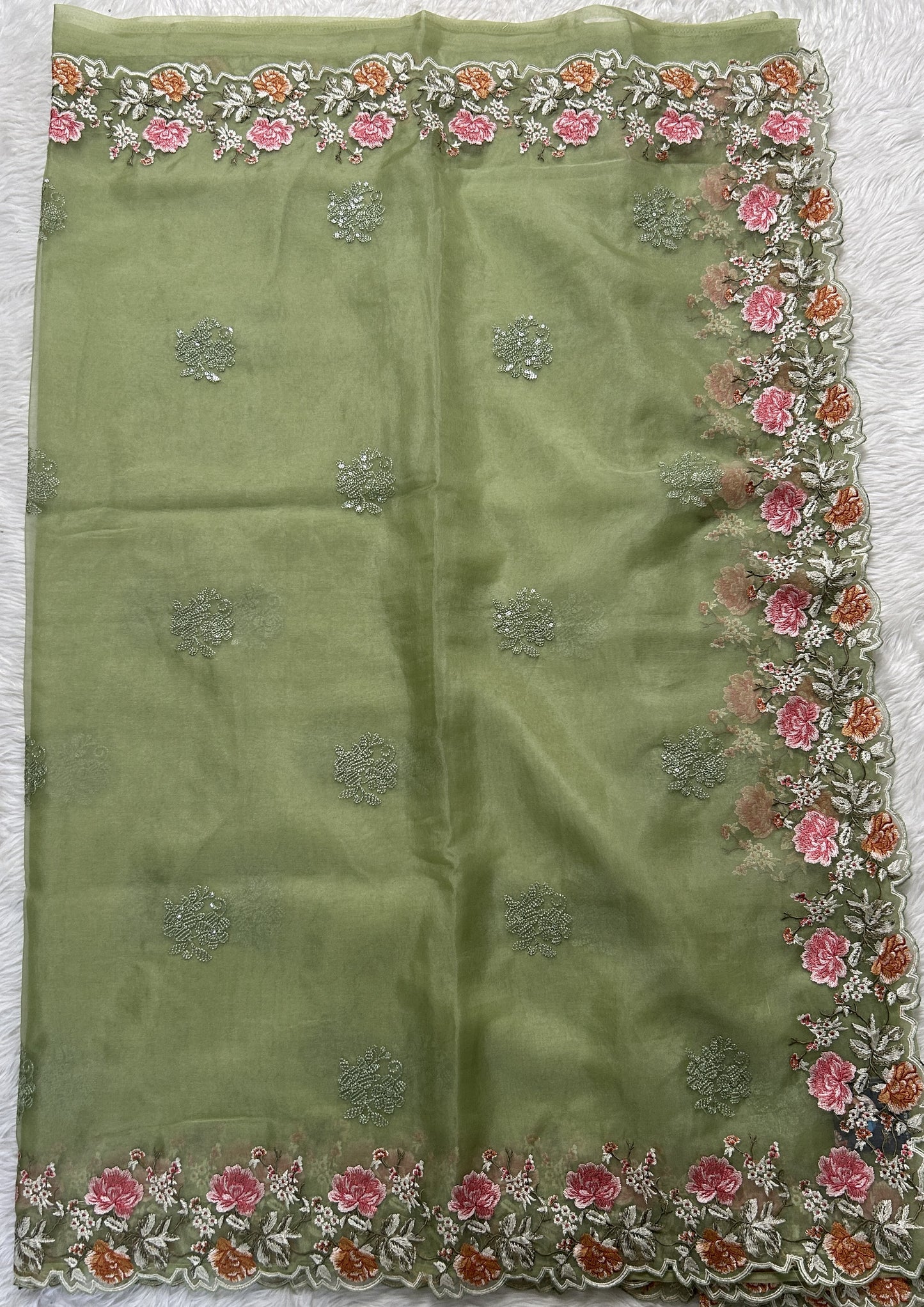 Soft Organza Designer Saree Olive Green colored Saree complemented with a Machine Embroidery border. - Sampradaya Designer Studio