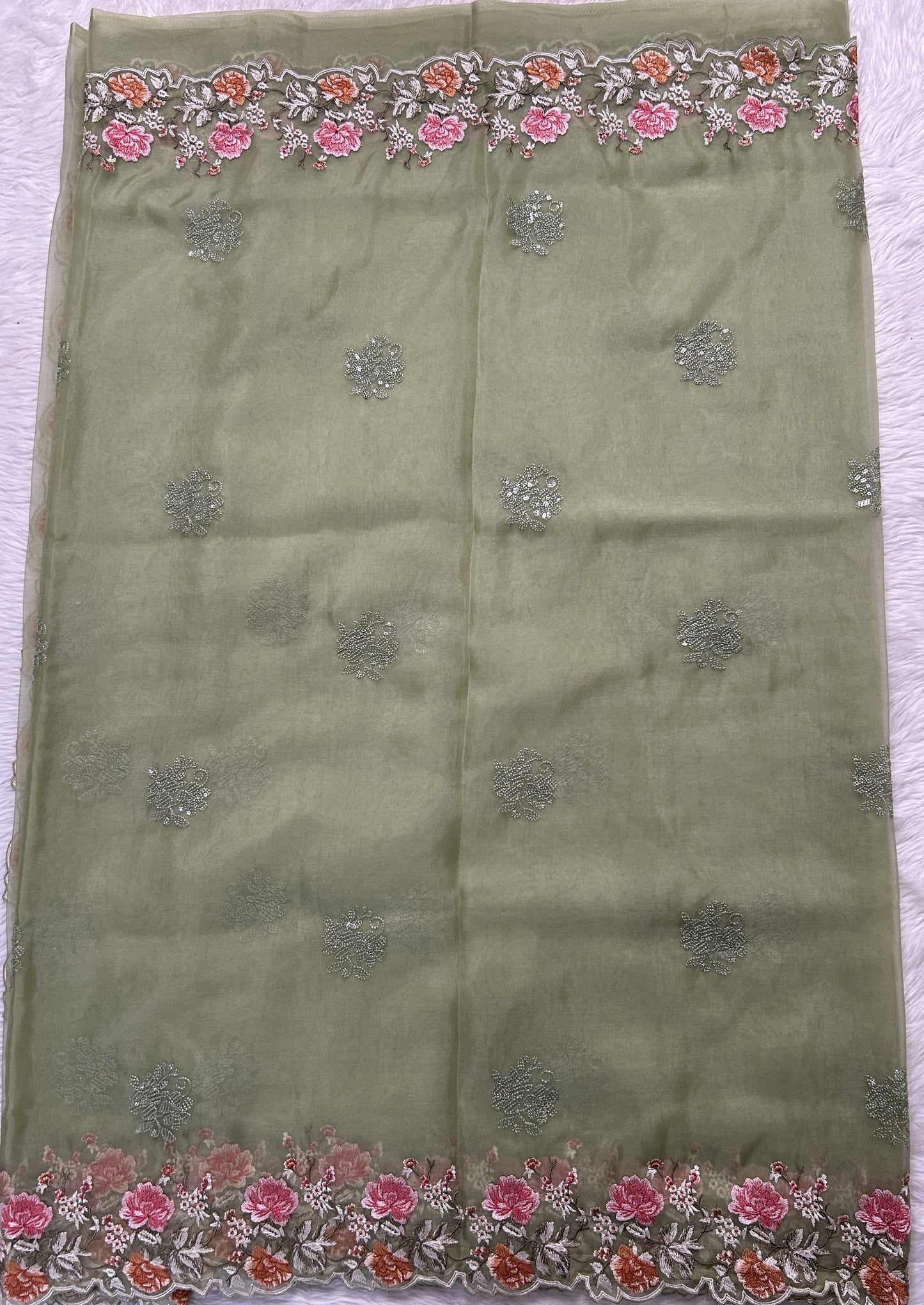 Soft Organza Designer Saree Olive Green colored Saree complemented with a Machine Embroidery border. - Sampradaya Designer Studio