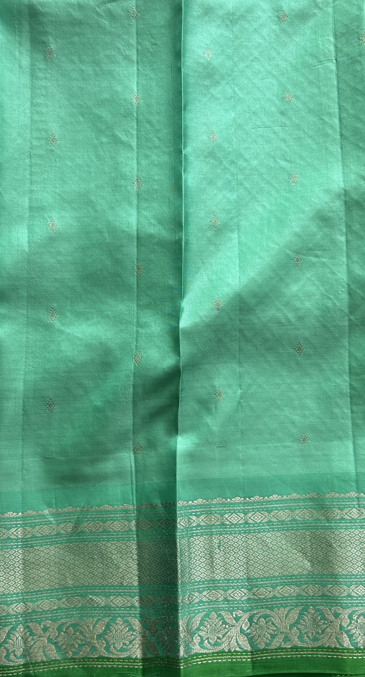 Gadwal Silk Saree Brown Colored complemented with a Sea Blue Color Zari Border. - Sampradaya Designer Studio