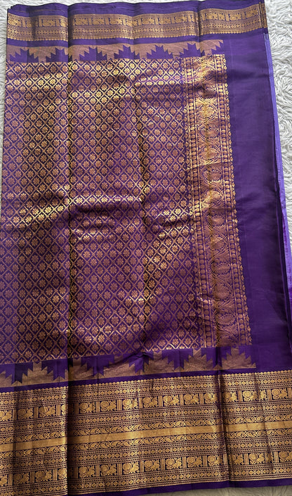 Gadwal Silk Saree Lavender Colored complemented with a Zari Border. - Sampradaya Designer Studio