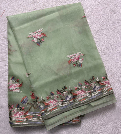 Soft Organza Designer Saree Light Green colored Saree complemented with a Machine Embroidery border. - Sampradaya Designer Studio