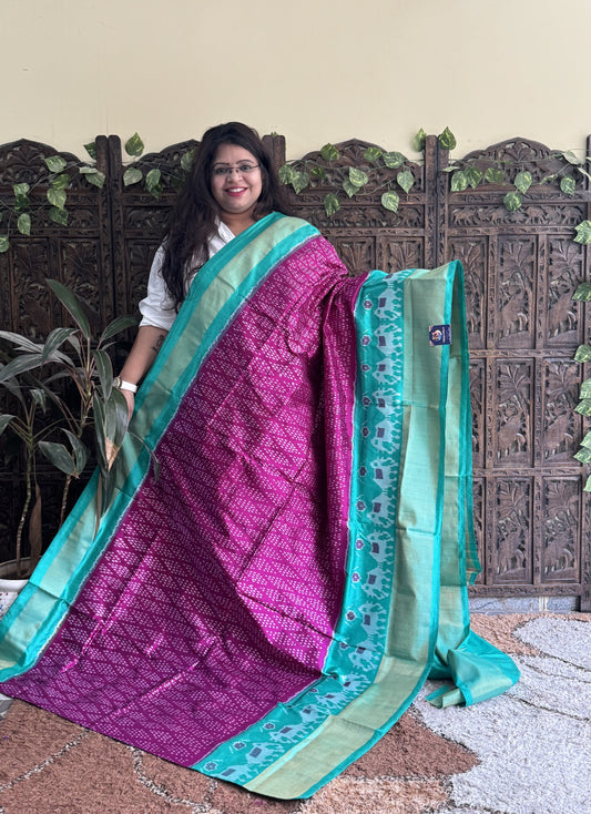 Ikkat Pattu Saree Hot Pink colored complemented with a Zari border.