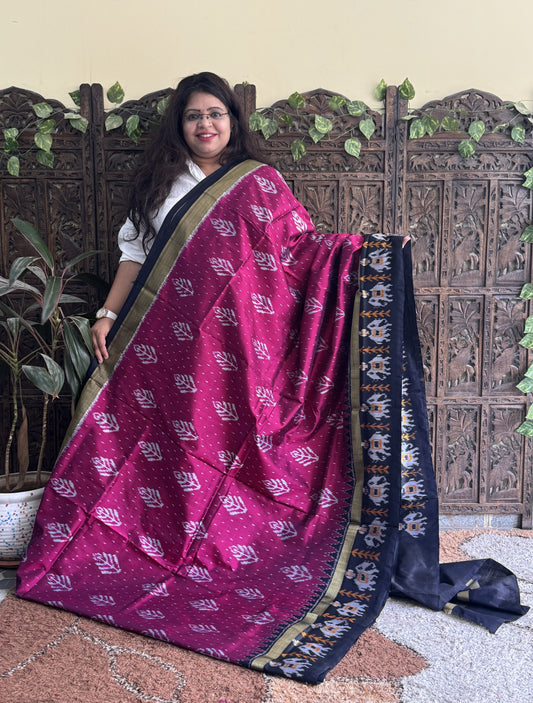 Ikkat Pattu Saree Dark Pink colored complemented with a Ikkat Zari border.