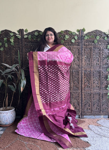 Ikkat Pattu Saree Light Pink colored complemented with a Zari border.