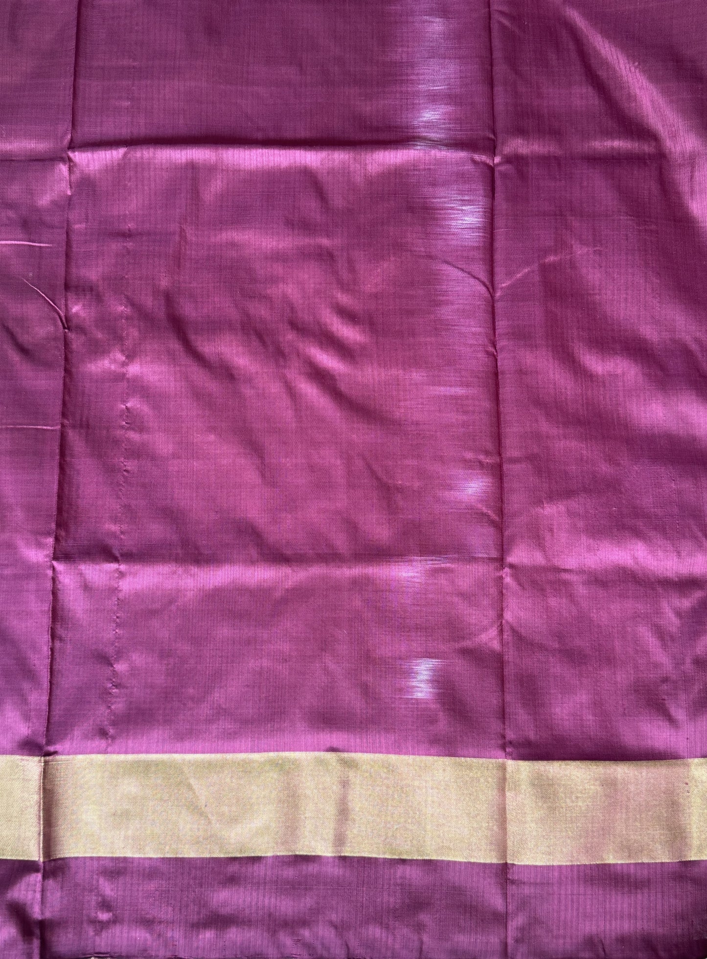 Ikkat Pattu Saree Light Pink colored complemented with a Zari border.