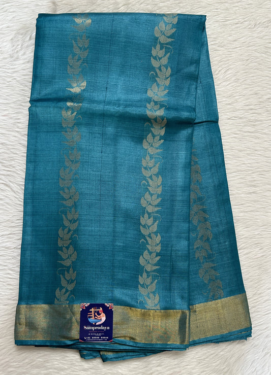 Tussar Silk Saree Blue colored Saree complemented with a Gold Zari border. - Sampradaya Designer Studio