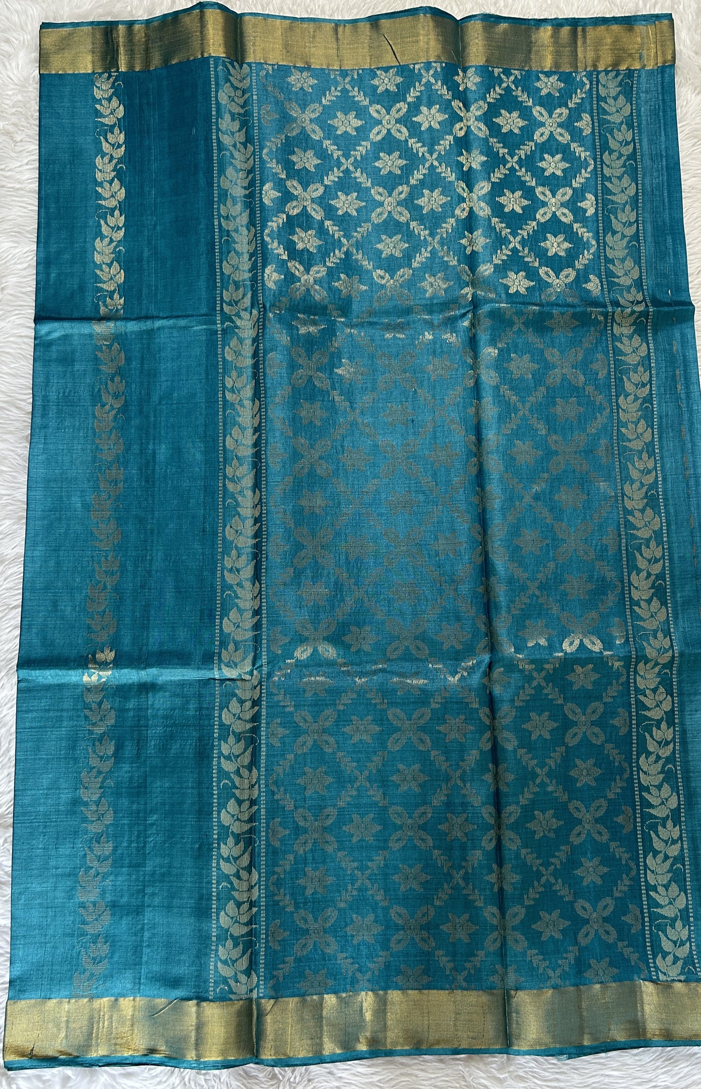 Tussar Silk Saree Blue colored Saree complemented with a Gold Zari border. - Sampradaya Designer Studio