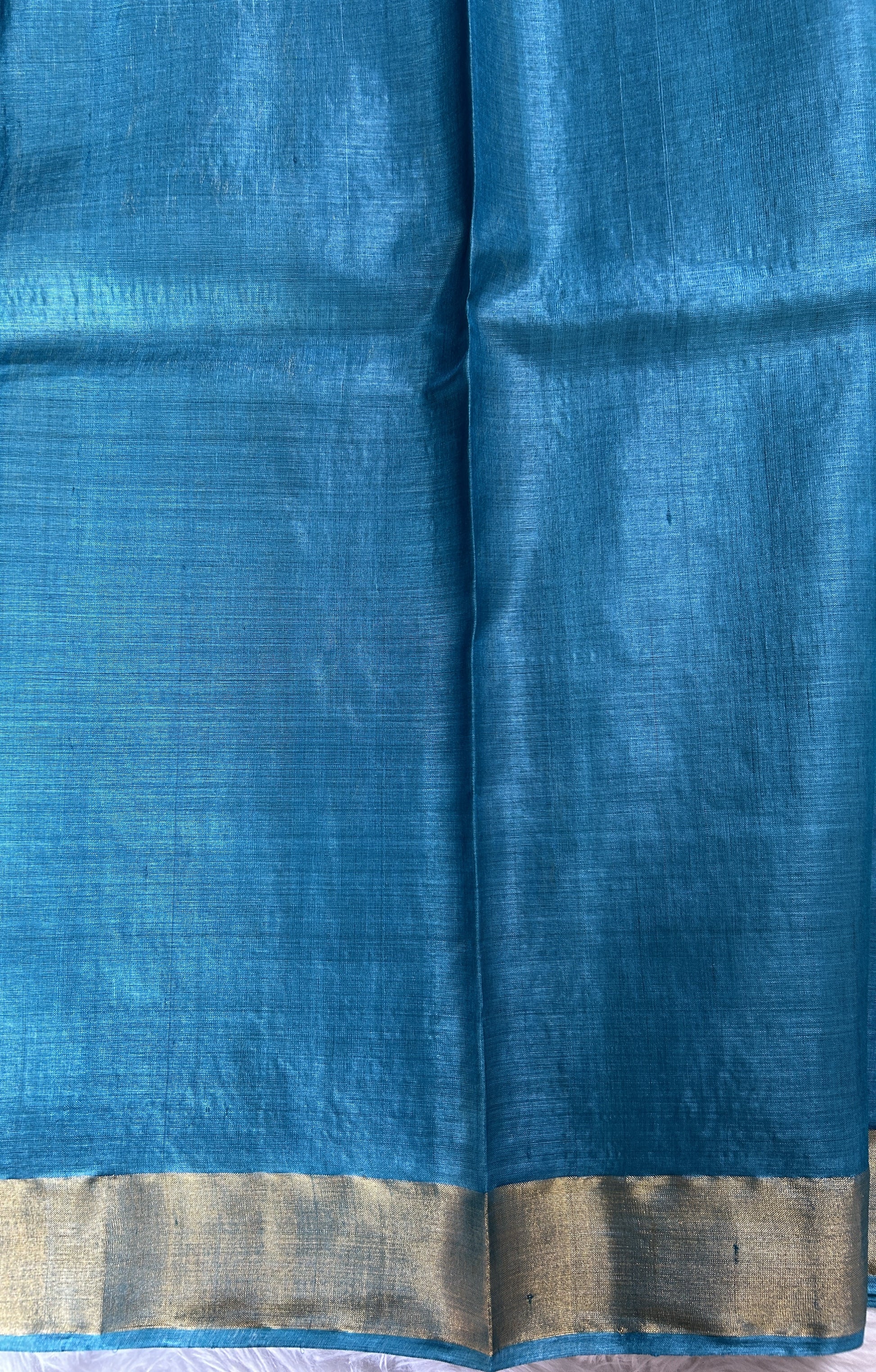 Tussar Silk Saree Blue colored Saree complemented with a Gold Zari border. - Sampradaya Designer Studio