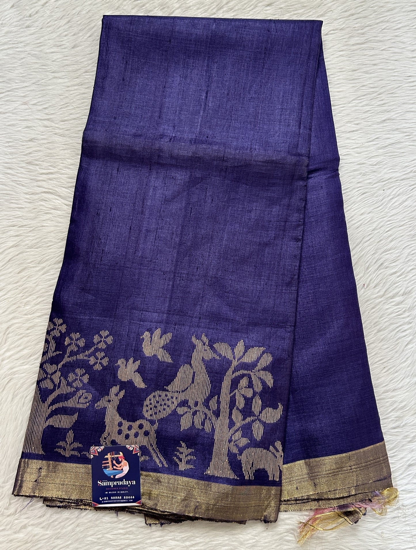 Tussar Silk Saree Ink Blue colored Saree complemented with a Gold Zari border. - Sampradaya Designer Studio