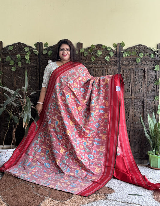 Ikkat Pattu Saree Onion Pink colored complemented with a Patola border.