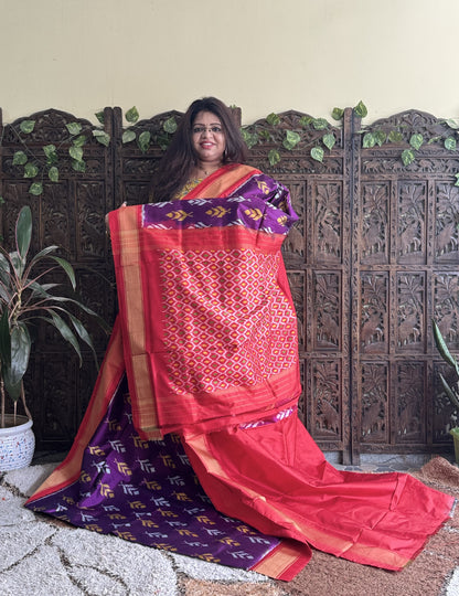 Ikkat Pattu Saree Dark Purple colored complemented with a Zari border.