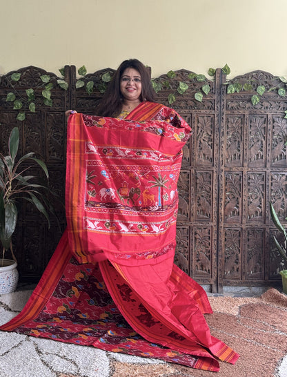 Ikkat Pattu Saree Red colored complemented with a Patola border.