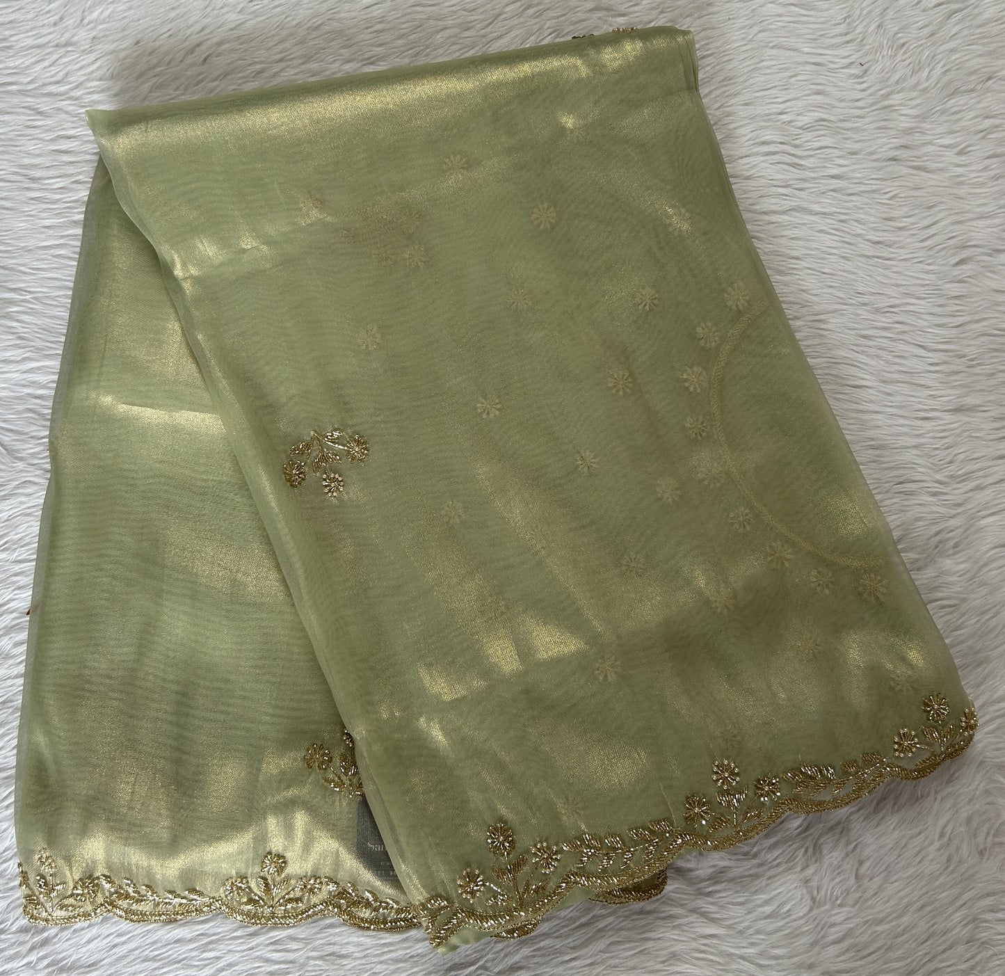 Tissue Organza Designer Saree Green colored Saree complemented with a Handcrafted border. - Sampradaya Designer Studio