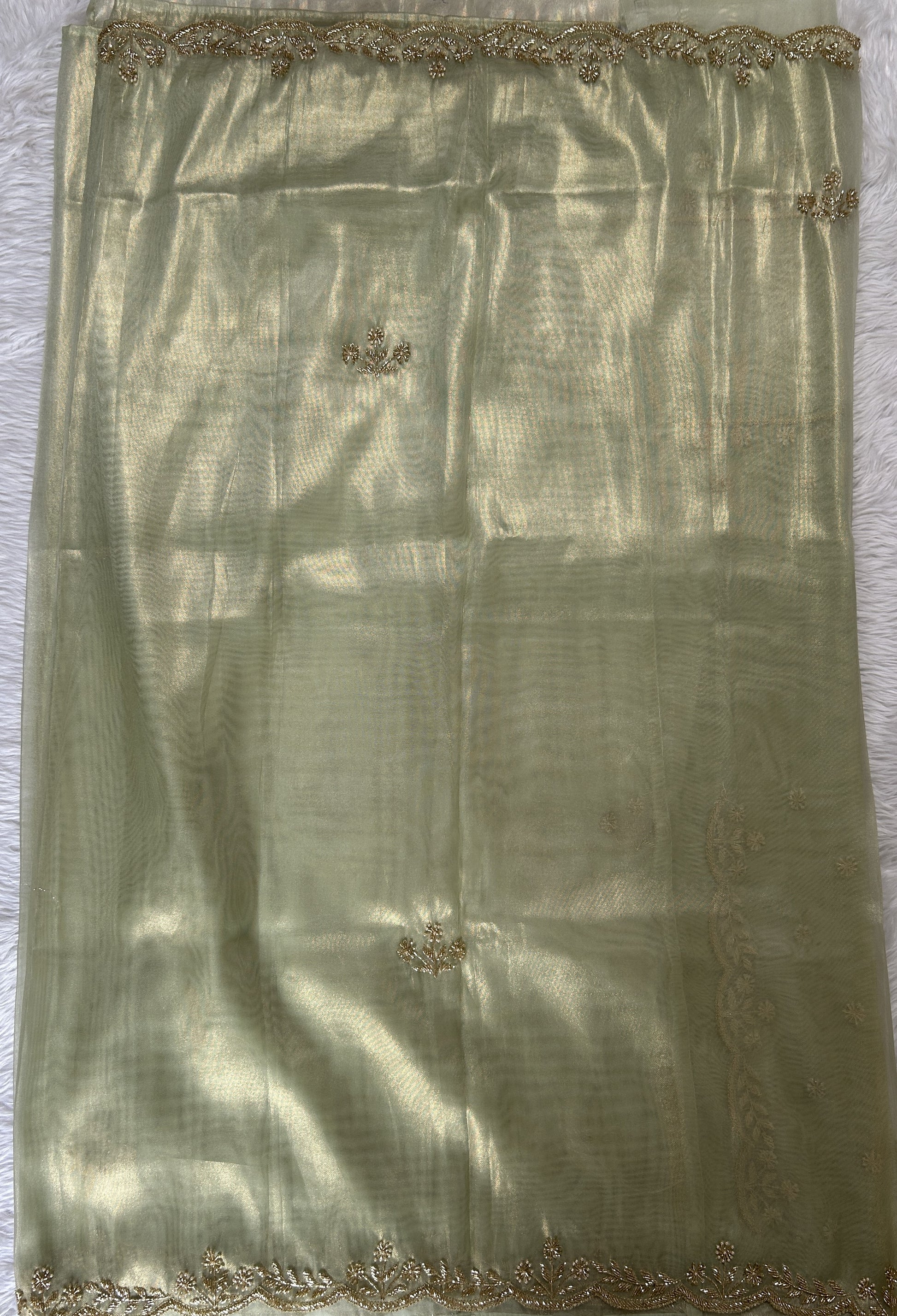 Tissue Organza Designer Saree Green colored Saree complemented with a Handcrafted border. - Sampradaya Designer Studio