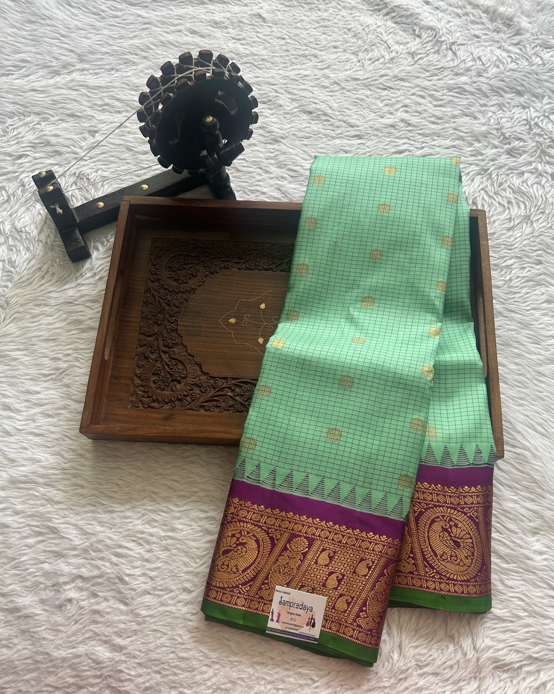 Gadwal Pattu Saree Light Green colored saree complemented with a Zari border - Sampradaya Designer Studio