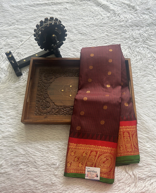 Gadwal Pattu Saree Brown colored saree complemented with a Zari border - Sampradaya Designer Studio