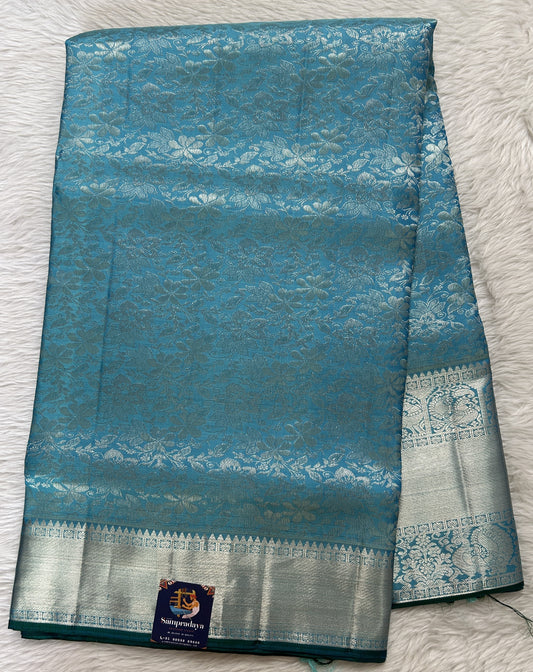 Kanjivaram Bridal Silk Saree Blue colored Saree complemented with a Silver Zari Weaving border. - Sampradaya Designer Studio