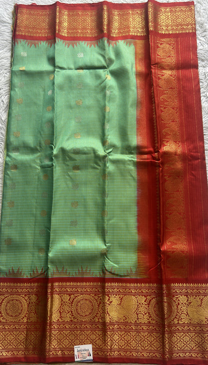 Gadwal Pattu Saree Light Green Colored Complemented With a Zari Border - Sampradaya Designer Studio