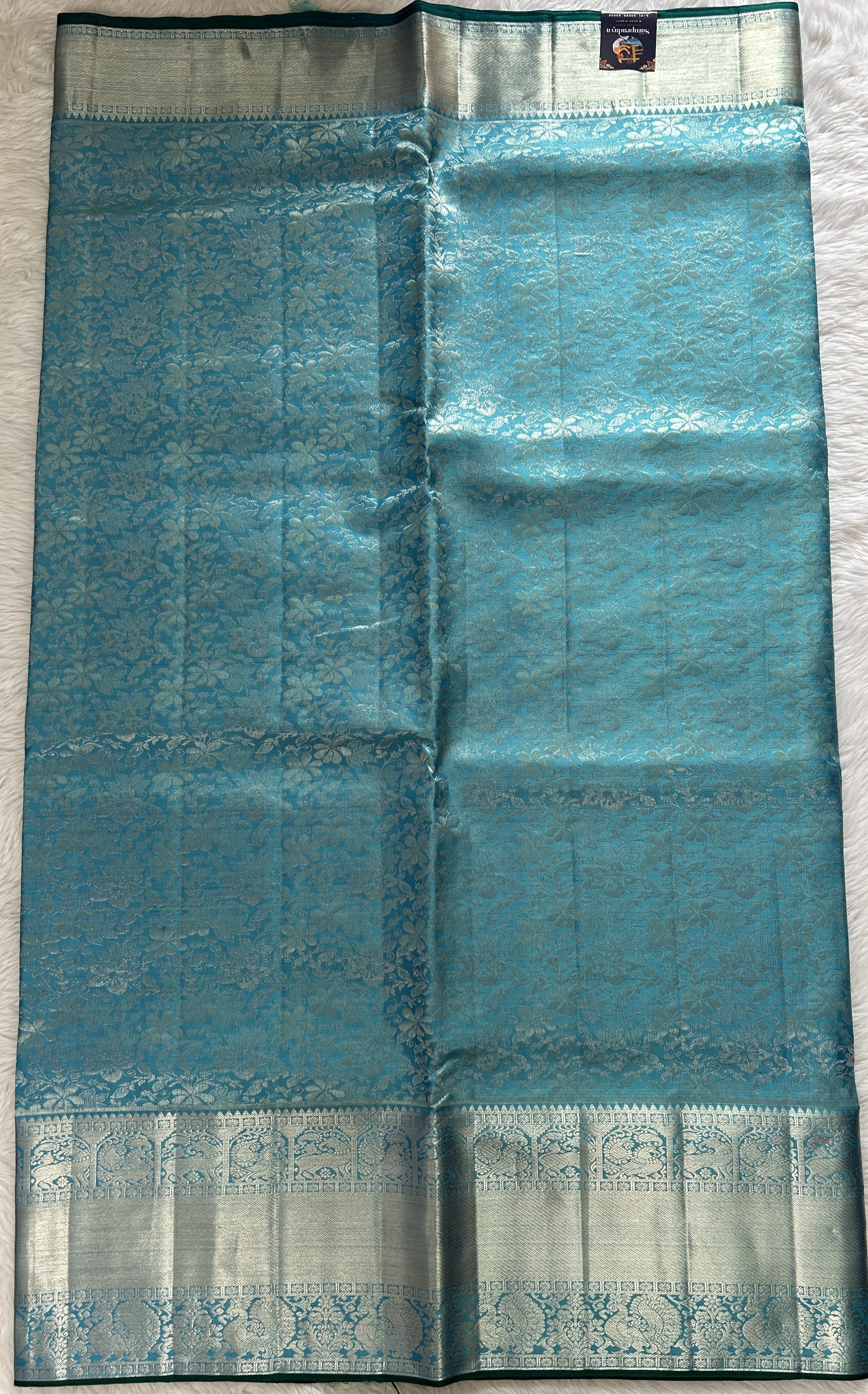 Kanjivaram Bridal Silk Saree Blue colored Saree complemented with a Silver Zari Weaving border. - Sampradaya Designer Studio