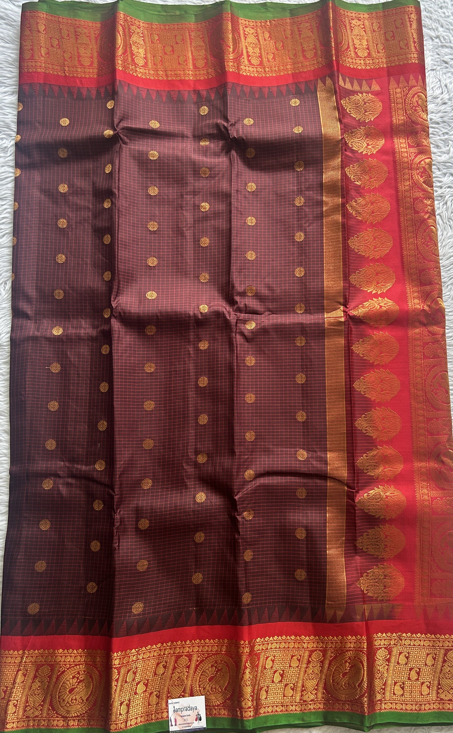 Gadwal Pattu Saree Brown colored saree complemented with a Zari border - Sampradaya Designer Studio