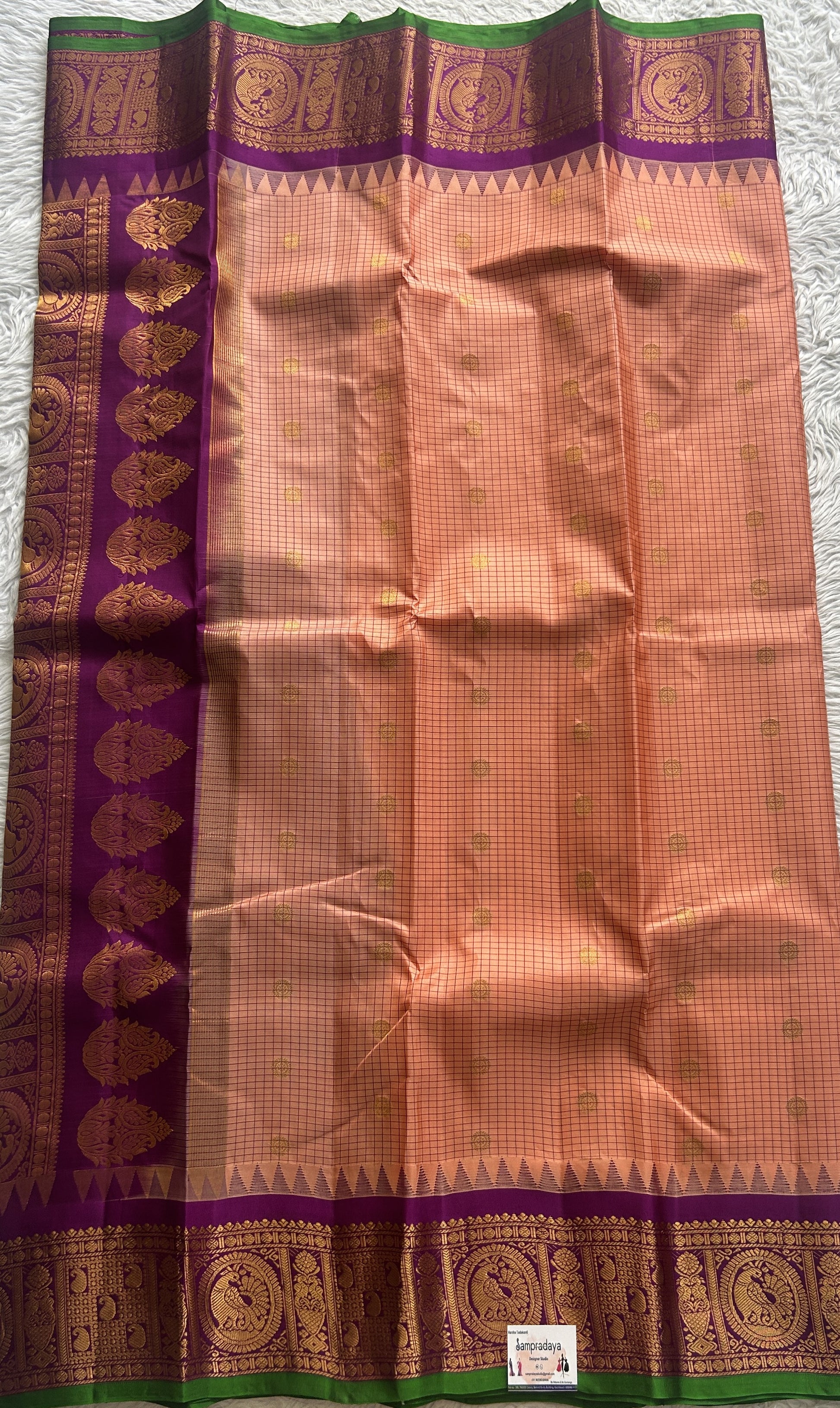 Gadwal Pattu Saree Peach colored saree complemented with a Zari border - Sampradaya Designer Studio