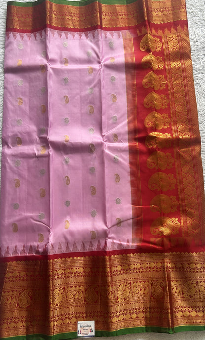 Gadwal Pattu Saree Baby Pink colored saree complemented with a Zari border - Sampradaya Designer Studio