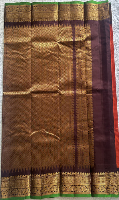 Gadwal Pattu Saree Orange colored saree complemented with a Zari border - Sampradaya Designer Studio