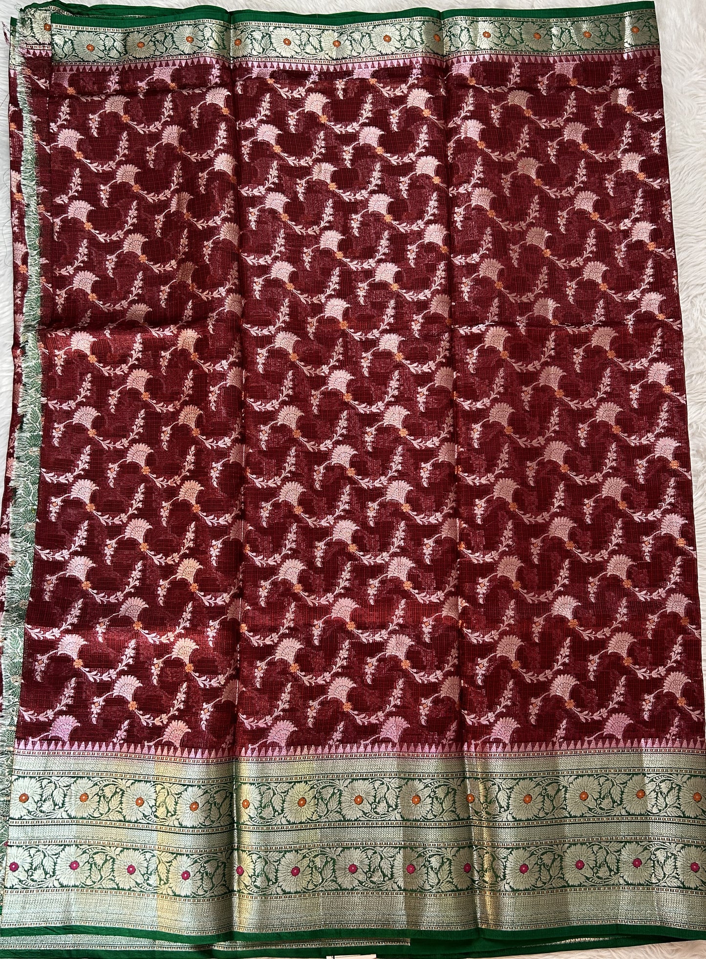 Silk kota Saree Maroon color complemented with a Bottle Green Color Zari Weaving Border. - Sampradaya Designer Studio