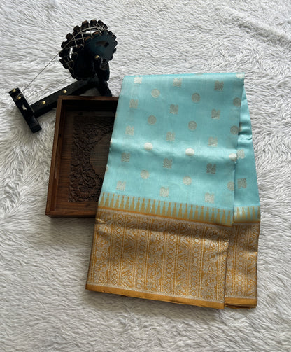 Venkatagiri Pattu Saree Sky Blue Complemented With a Mustard Color Zari Border.