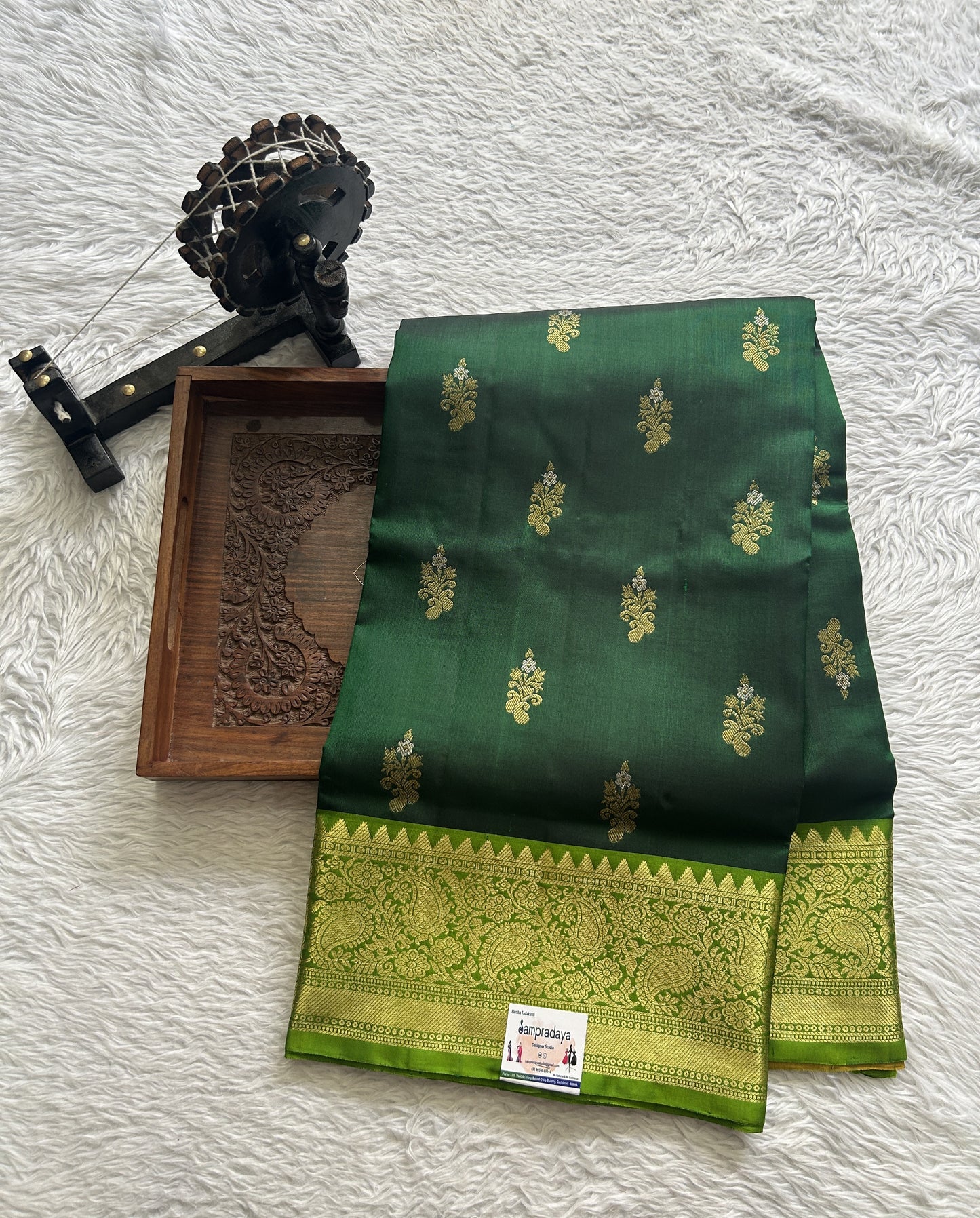 Venkatagiri Pattu Saree Dark Green Complemented With a Green Color Zari Border.