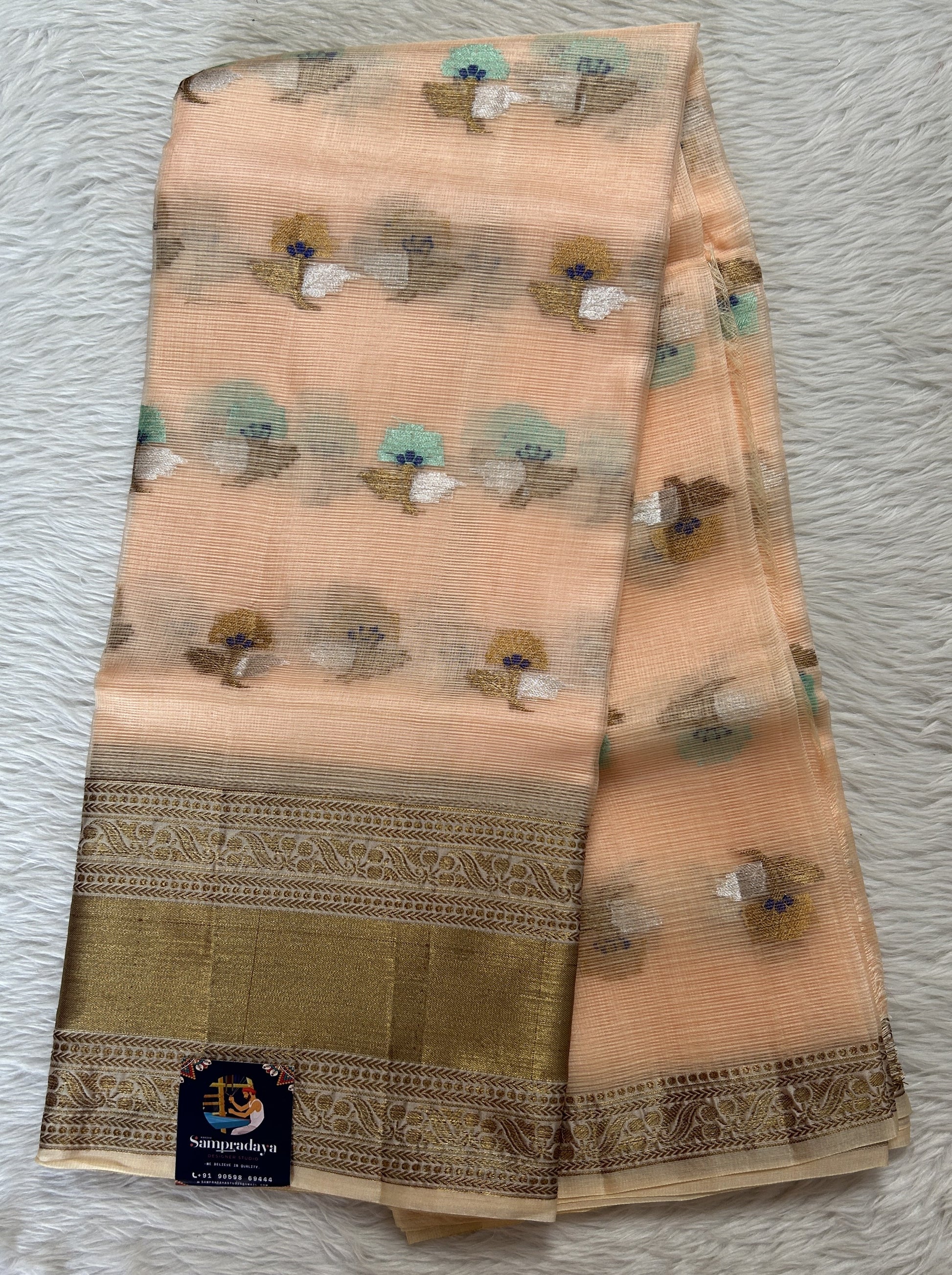 Silk kota Saree Coral color complemented with a Gold Zari Weaving Border. - Sampradaya Designer Studio