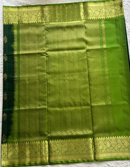 Venkatagiri Pattu Saree Dark Green Complemented With a Green Color Zari Border.