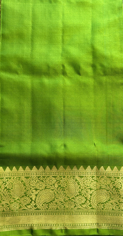 Venkatagiri Pattu Saree Dark Green Complemented With a Green Color Zari Border.