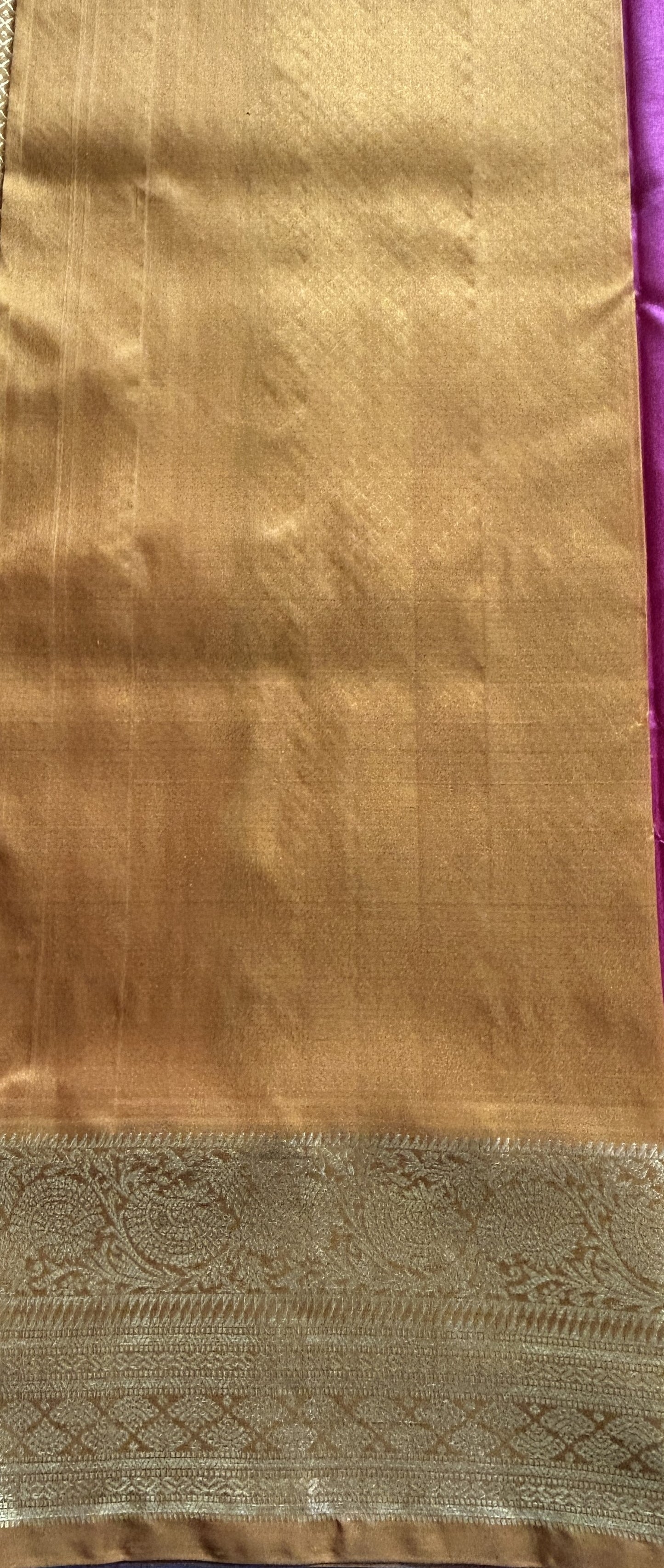 Venkatagiri Pattu Saree Pink Complemented With a Mustard Color Zari Border.