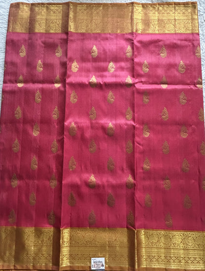 Venkatagiri Pattu Saree Pink Complemented With a Mustard Color Zari Border.