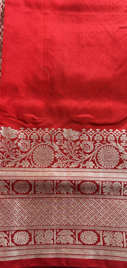 Venkatagiri Pattu Saree Brown Complemented With a Red Color Zari Border.