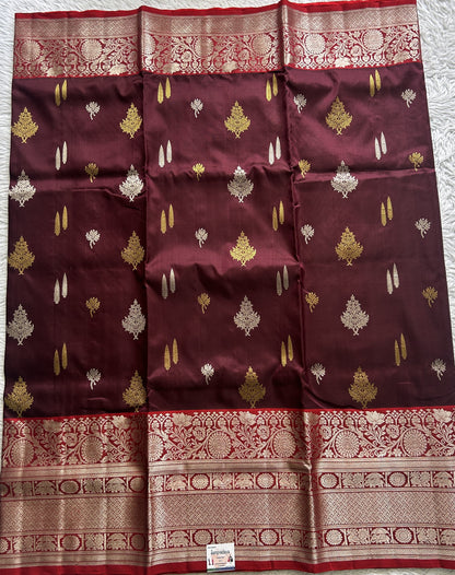 Venkatagiri Pattu Saree Brown Complemented With a Red Color Zari Border.