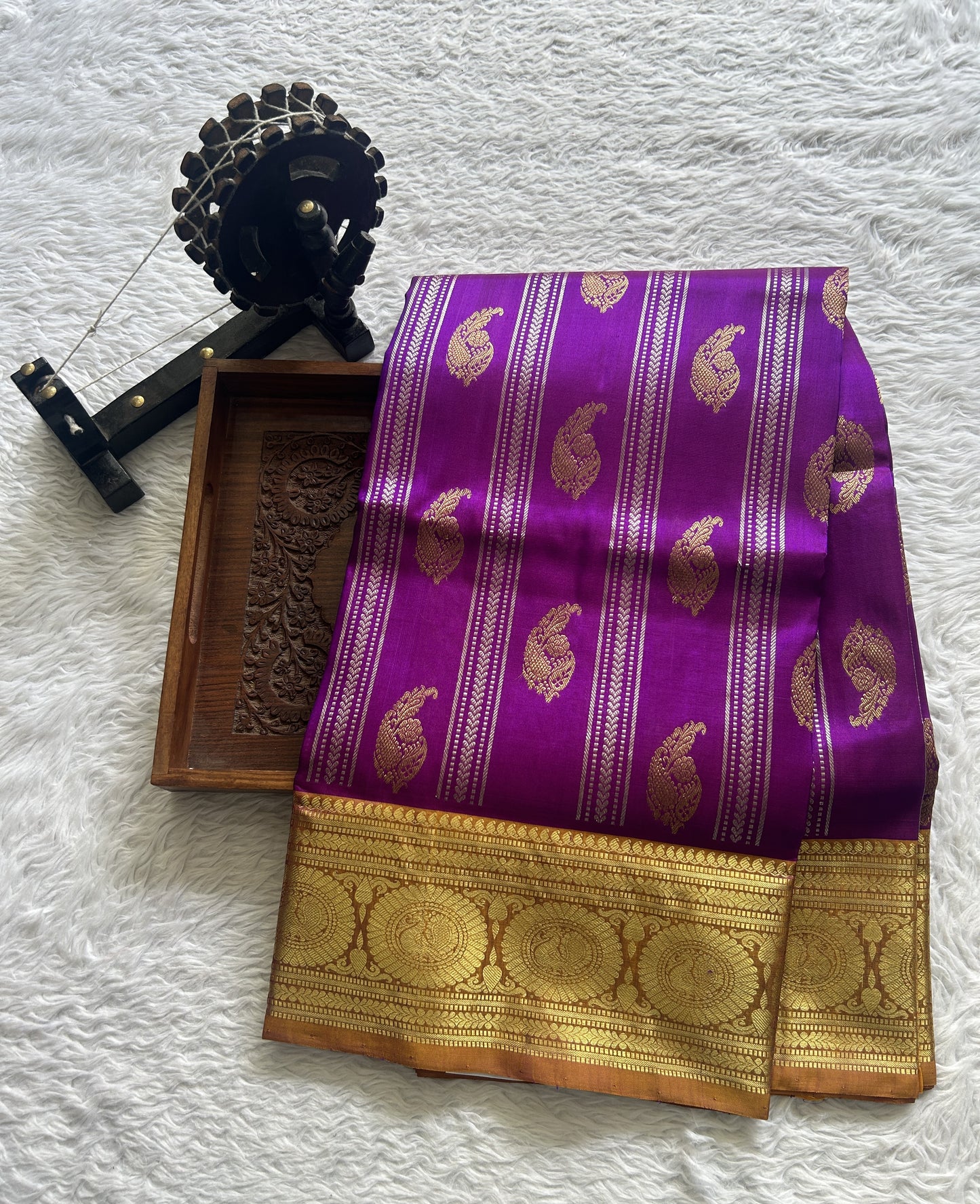 Venkatagiri Pattu Saree Violet Colored Complemented With a Light Apricot Color Zari Border.