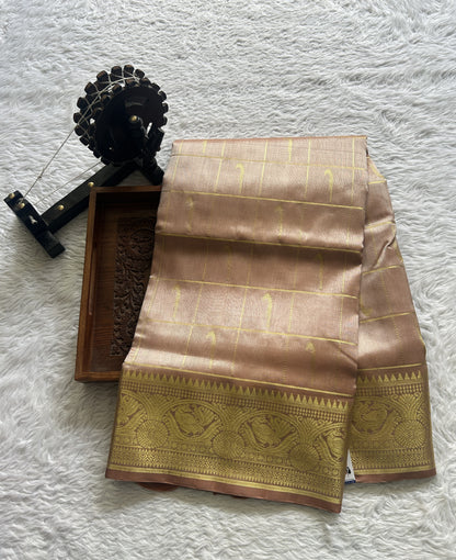 Venkatagiri Pattu Saree Beige Colored Complemented With a Zari Border.