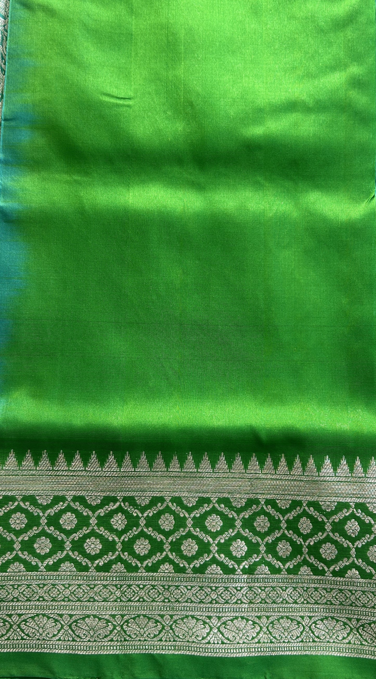 Venkatagiri Pattu Saree Rama Green Colored Complemented With a Zari Border.