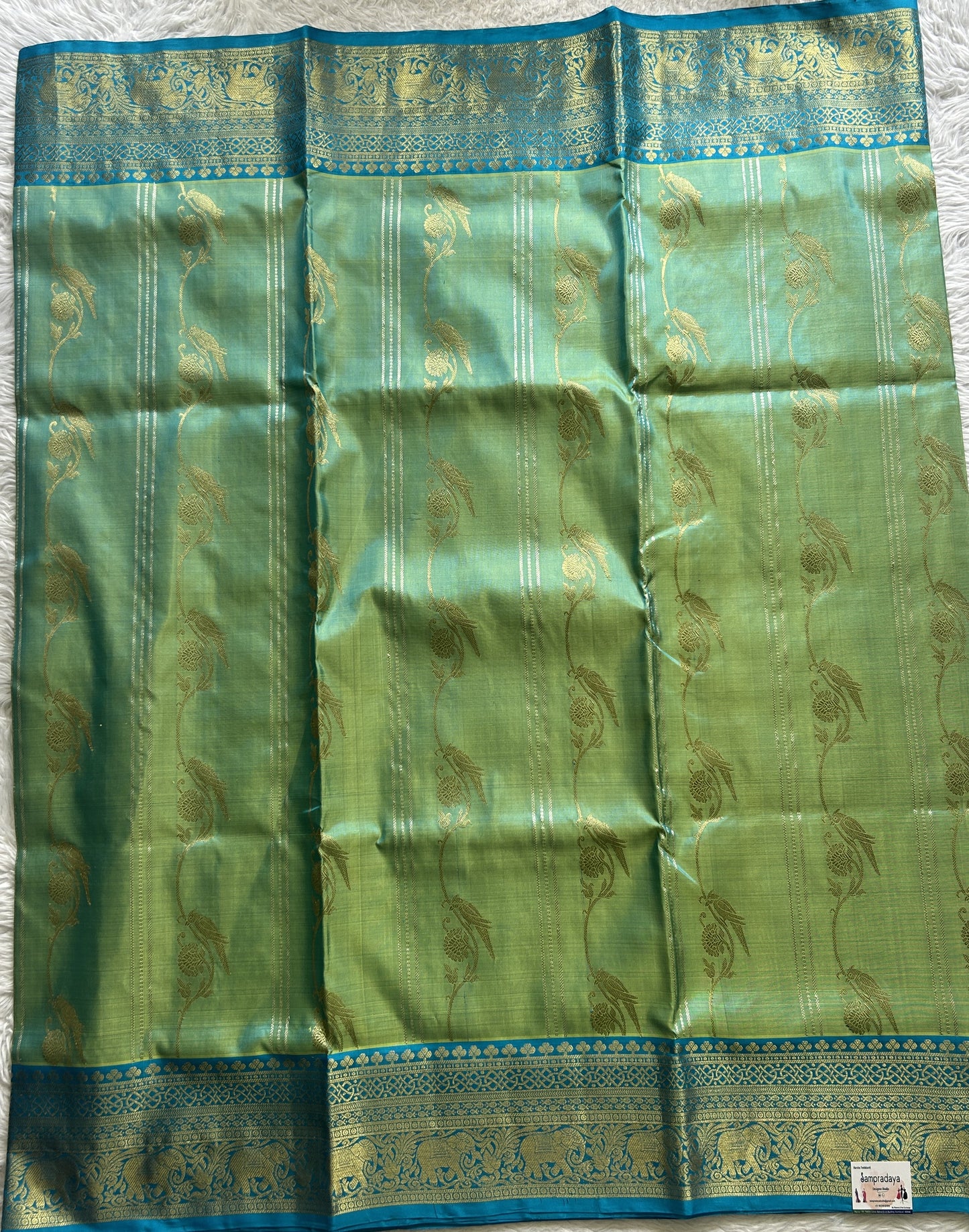 Venkatagiri Pattu Saree Light Green Colored Complemented With a Zari Border.