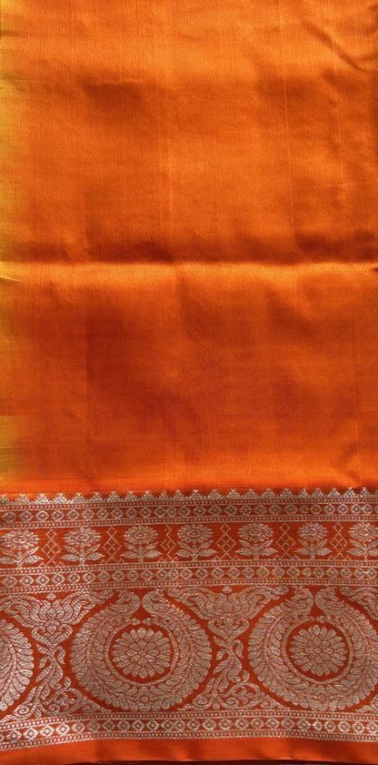 Venkatagiri Pattu Saree Yellow Colored Complemented With a Orange Color Zari Border.