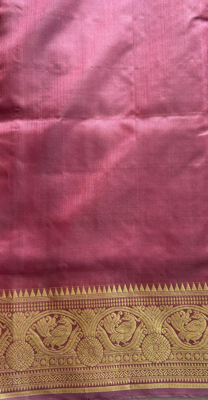 Venkatagiri Pattu Saree Pink Colored Complemented With a Zari Border.