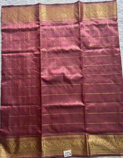 Venkatagiri Pattu Saree Pink Colored Complemented With a Zari Border.