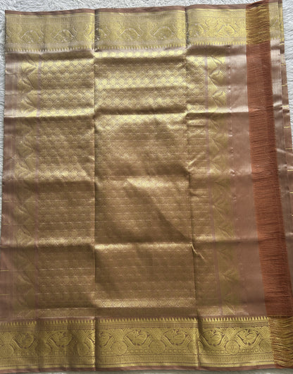 Venkatagiri Pattu Saree Beige Colored Complemented With a Zari Border.