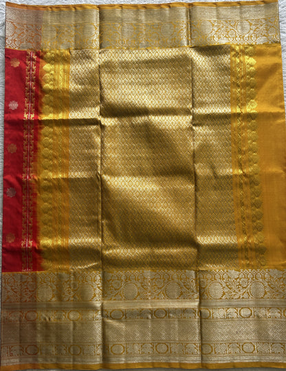 Venkatagiri Pattu Saree Red Colored Complemented With a Mustard Color Zari Border.