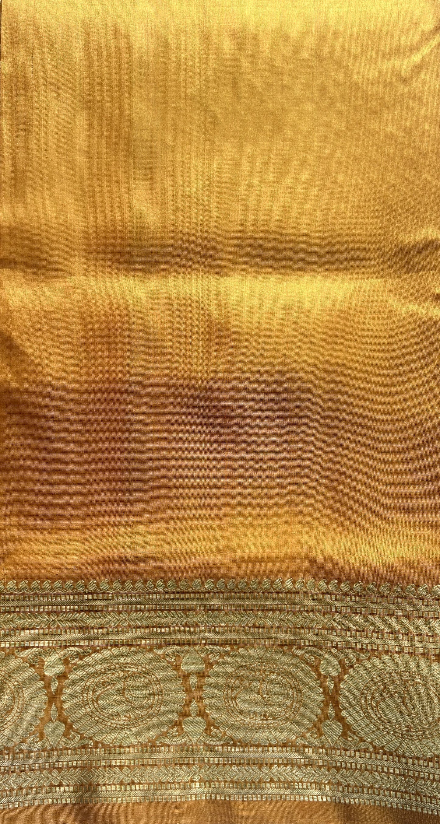 Venkatagiri Pattu Saree Violet Colored Complemented With a Light Apricot Color Zari Border.