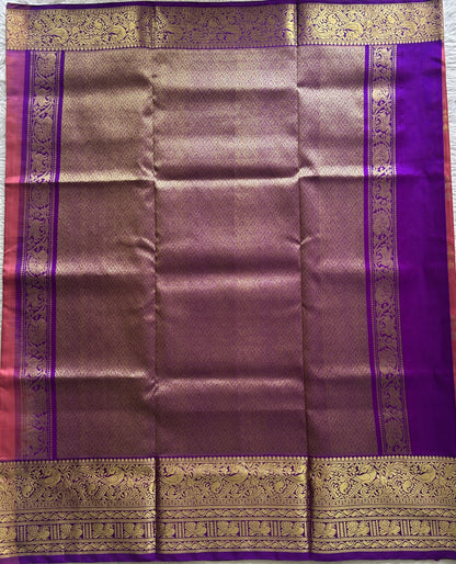 Venkatagiri Pattu Saree Pink Colored Complemented With a Violet Color Zari Border.