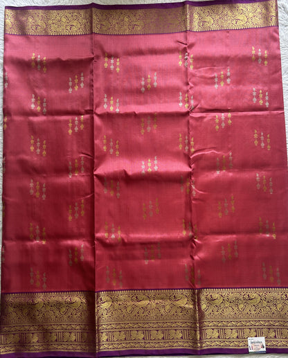 Venkatagiri Pattu Saree Pink Colored Complemented With a Violet Color Zari Border.